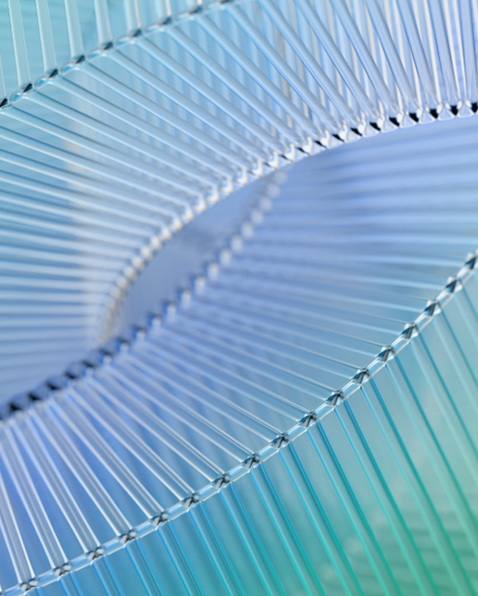 An abstract 3D illustration of stacked, translucent glass discs in shades of blue and green, representing the structured layers of the Frontier Safety Framework.