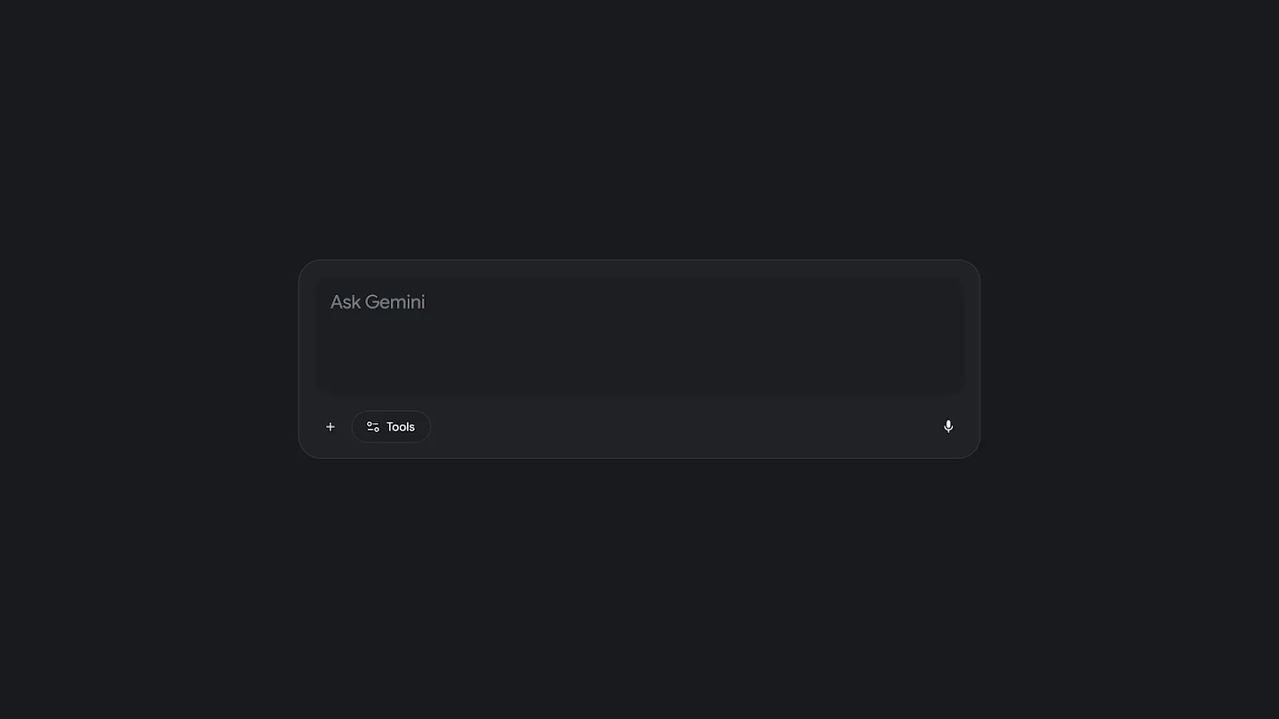 A rounded, light grey text input box with the placeholder "Ask Gemini", featuring a plus symbol, a "Tools" pill button, and a microphone icon along the bottom edge against a plain white background.