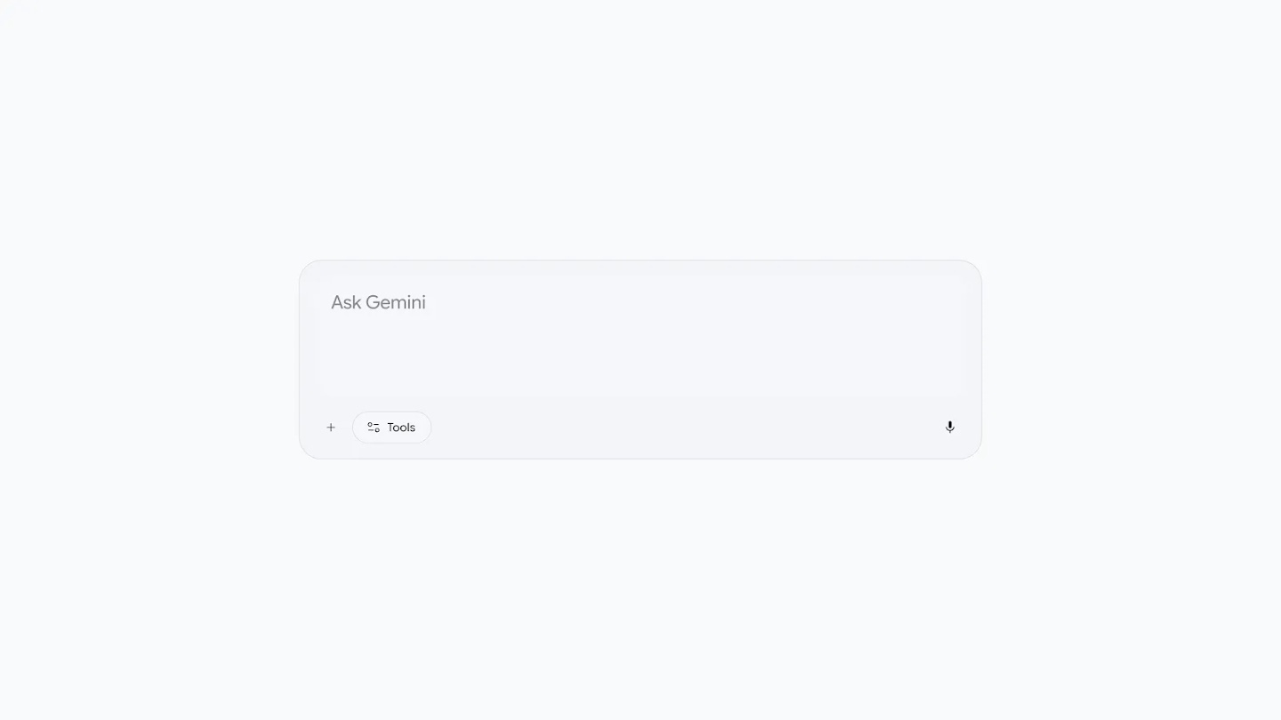 A rounded, light grey text input box with the placeholder "Ask Gemini", featuring a plus symbol, a "Tools" pill button, and a microphone icon along the bottom edge against a plain white background.