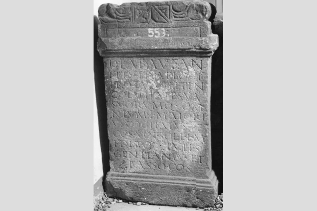 An ancient Roman stone altar (CIL XIII, 6665) dedicated to the Matronae Aufaniae, featuring a carved Latin inscription and decorative reliefs at the top.