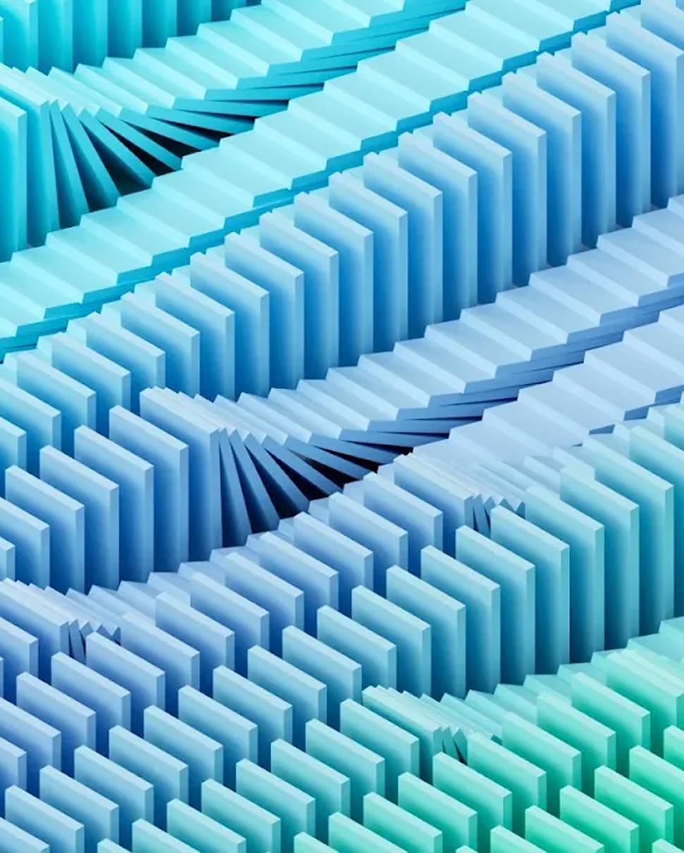 An abstract 3D illustration of stacked, translucent glass discs in shades of blue and green, representing the structured layers of the Frontier Safety Framework.