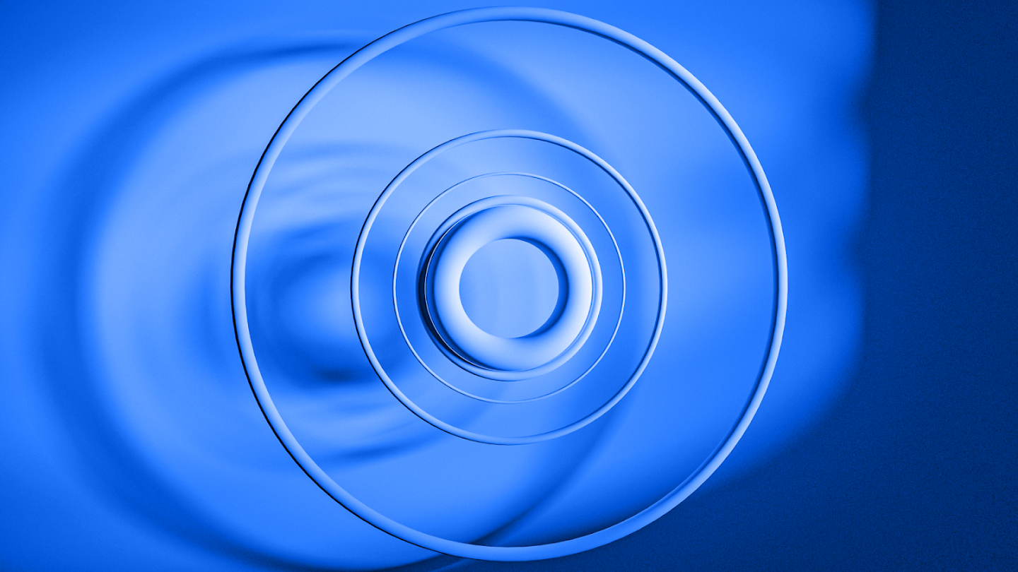 Concentric circles on a gradient blue background